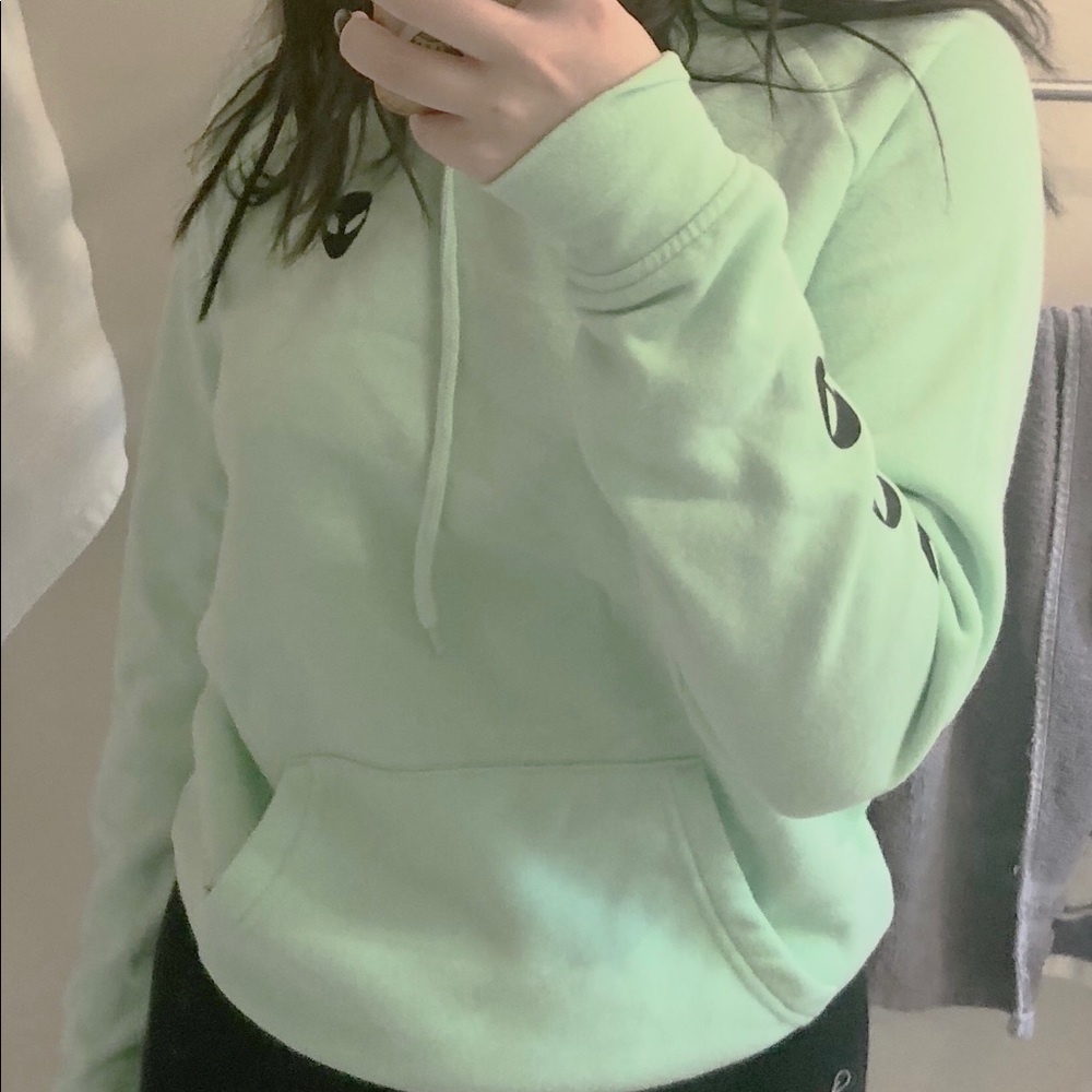 Alab mint green alien sweater from Zumiez.